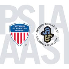 Light gray “PSIA AASI” lettering in background with “Professional Ski Instructors of America” and “American Association of Snowboard instructors” logos in foreground.
